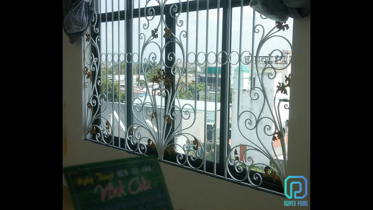 Mẫu khung bảo vệ cửa sổ - hoa sắt cửa sổ đẹp nhất cho biệt thự, nhà phố sang trọng, tinh tế wrought-iron-window-grill-decorative-wrought-iron-grille-10.jpg